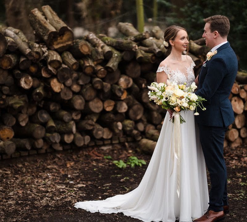 Bride and groom posing at Donington Park Farm Photographer